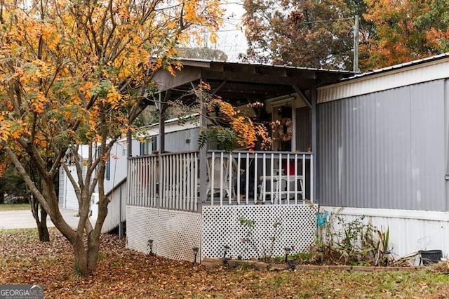 view of home's exterior featuring a deck