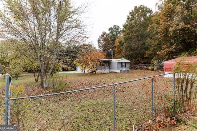 view of yard with a storage shed