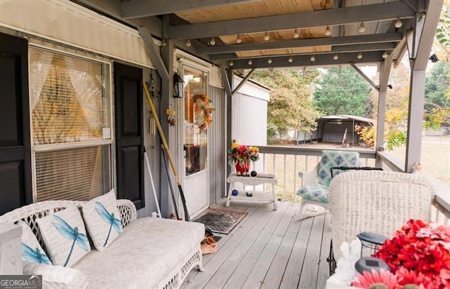 wooden deck featuring a gazebo