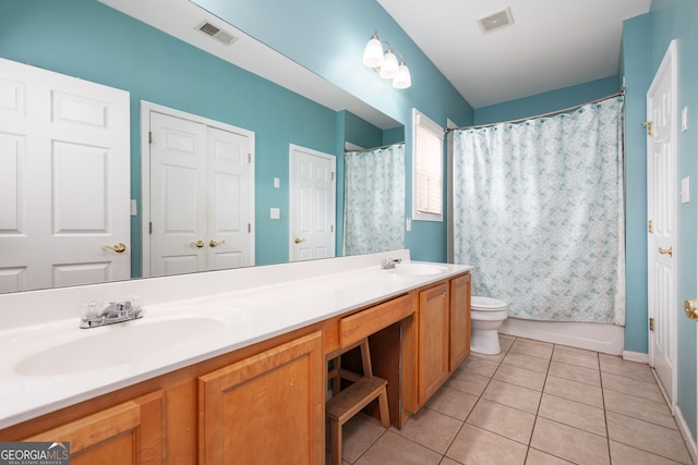 full bathroom with vanity, toilet, shower / bathtub combination with curtain, and tile patterned flooring