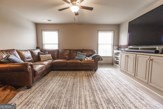 living room with ceiling fan