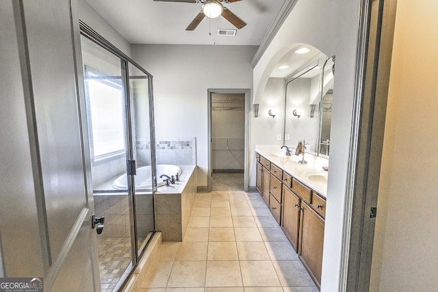 full bathroom with a shower stall, a sink, visible vents, and tile patterned floors