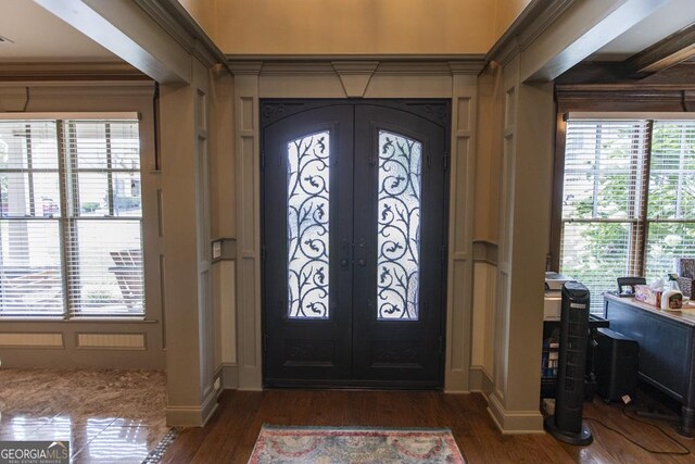 home office with beamed ceiling and dark hardwood / wood-style flooring