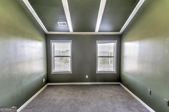 unfurnished room featuring carpet floors, baseboards, and ornamental molding