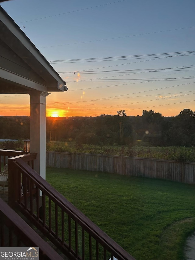 yard at dusk with fence