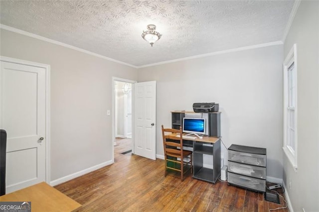 office space featuring ornamental molding, dark hardwood / wood-style floors, and a textured ceiling