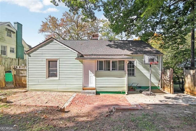 rear view of house featuring a patio area