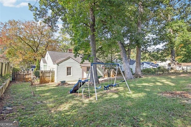 view of yard with a playground