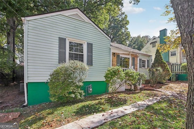 view of property exterior featuring central AC