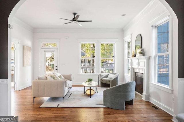 sunroom / solarium with ceiling fan