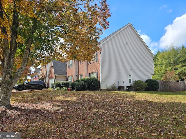 view of home's exterior featuring cooling unit