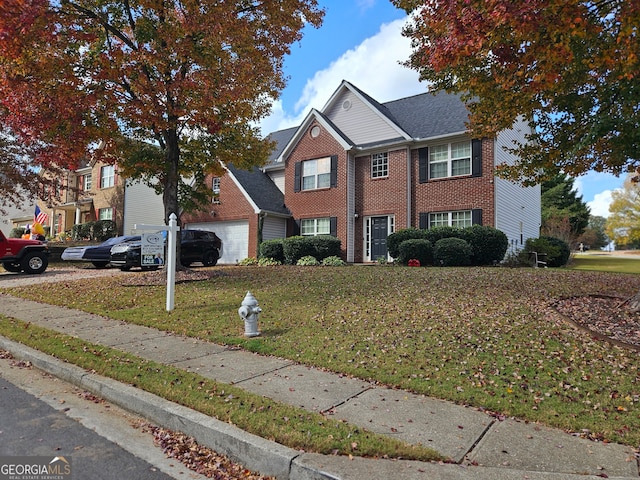 view of front of property with a front lawn