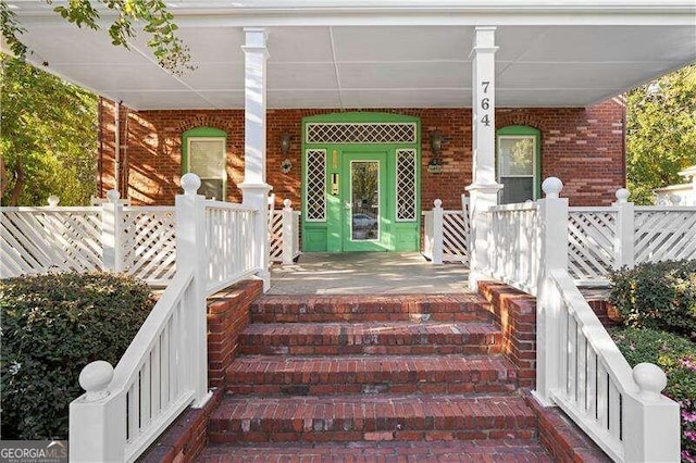 property entrance with a porch