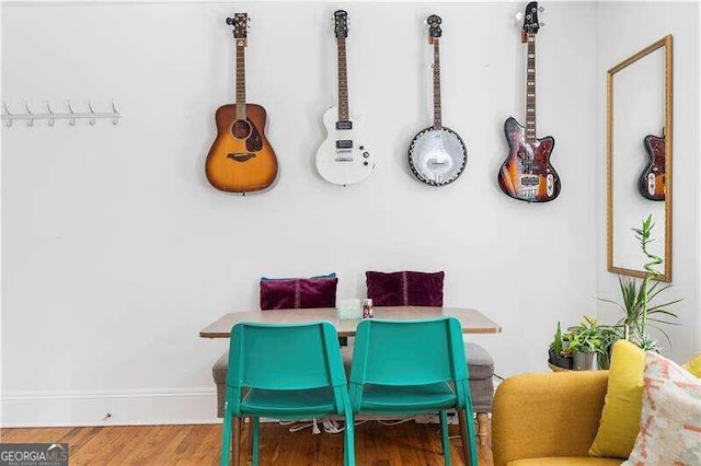 dining room with hardwood / wood-style flooring