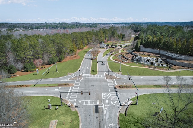 aerial view featuring a forest view