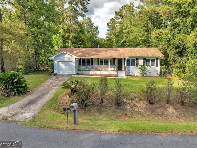 ranch-style home with a front yard, a porch, and a garage