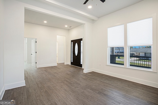 foyer entrance featuring ceiling fan and dark hardwood / wood-style floors