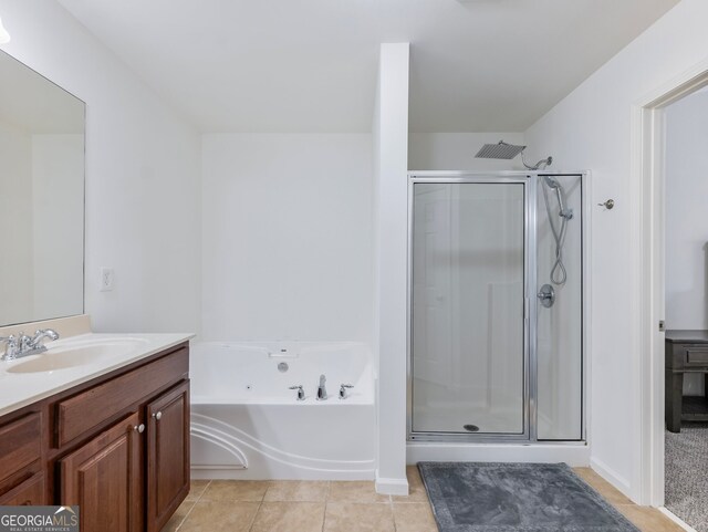 bathroom with vanity, independent shower and bath, and tile patterned flooring