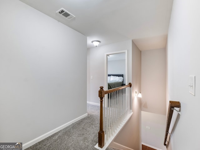 stairway with carpet flooring