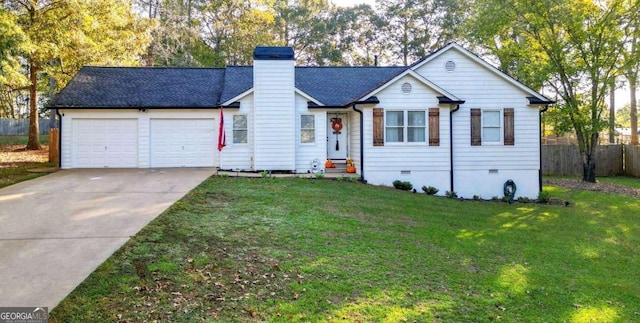 ranch-style home with a front yard and a garage