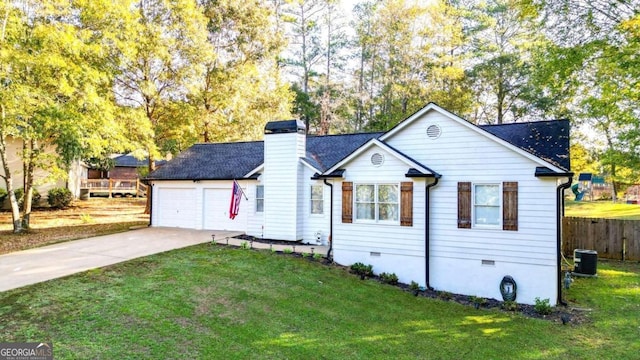 ranch-style home with a front lawn, central AC unit, and a garage