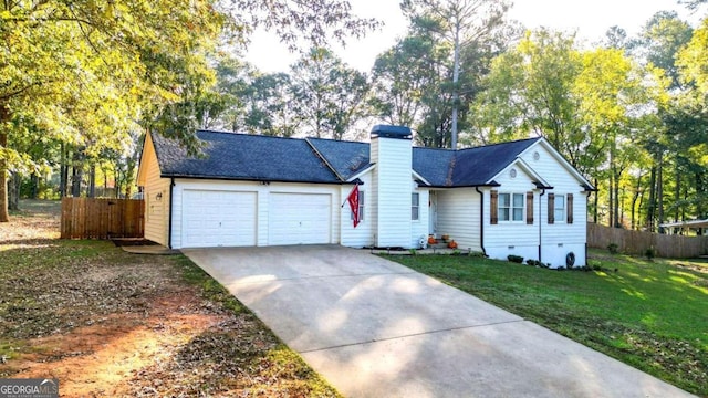 single story home with a front lawn and a garage