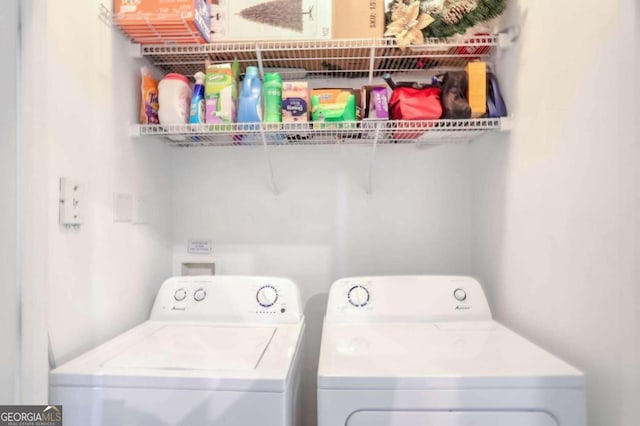 washroom featuring washer and dryer