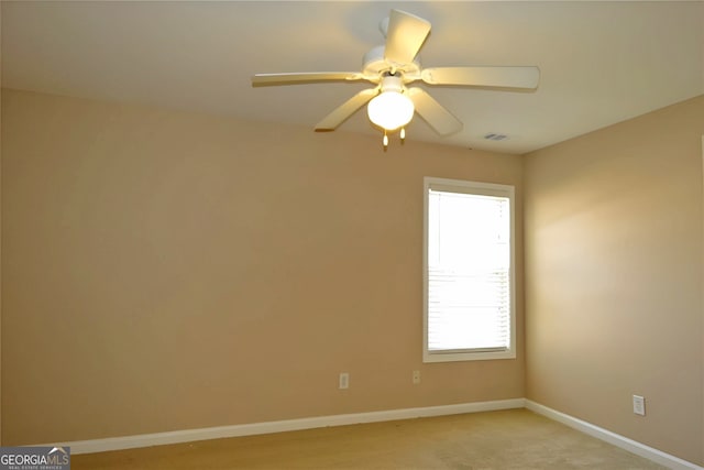 unfurnished room featuring ceiling fan