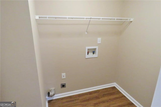 laundry area with hardwood / wood-style floors, electric dryer hookup, and hookup for a washing machine