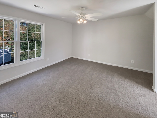 carpeted empty room with ceiling fan