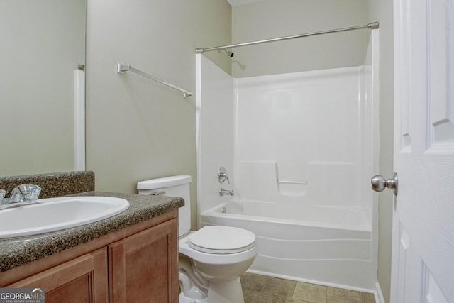 full bathroom featuring vanity, shower / bathing tub combination, toilet, and tile patterned floors