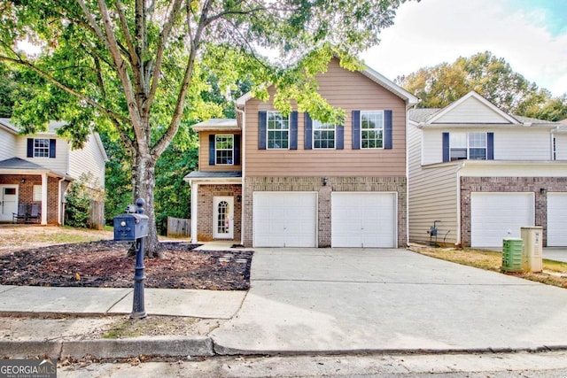 front of property with a garage