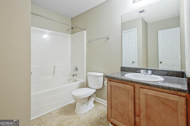 full bathroom with vanity, toilet, a textured ceiling, and  shower combination