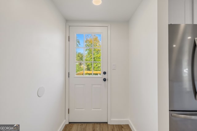 doorway featuring light hardwood / wood-style flooring