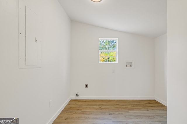 laundry room with hookup for an electric dryer, washer hookup, and light wood-type flooring