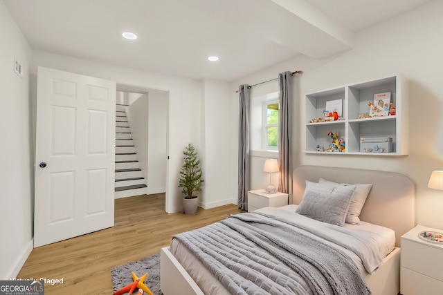 bedroom featuring light hardwood / wood-style flooring