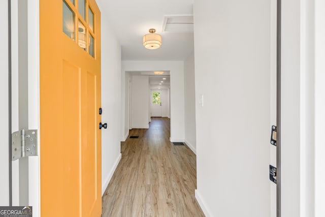 corridor featuring light wood-type flooring