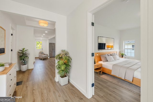 hallway featuring light hardwood / wood-style floors