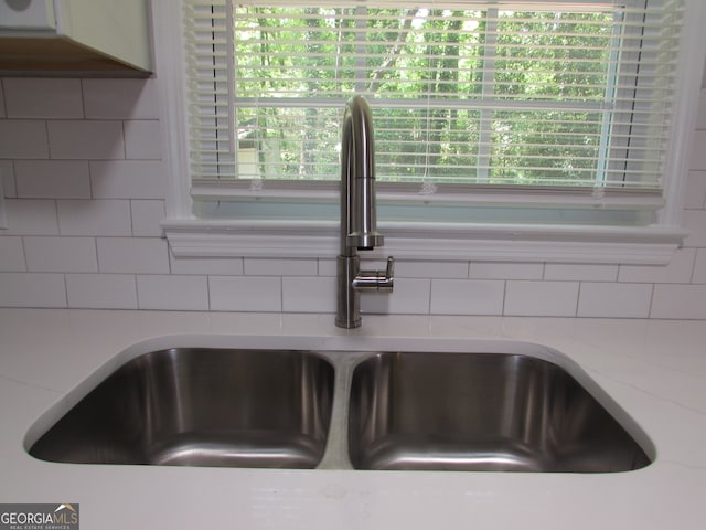 details with tasteful backsplash and sink