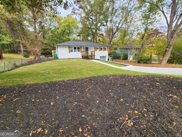 ranch-style home with a front yard