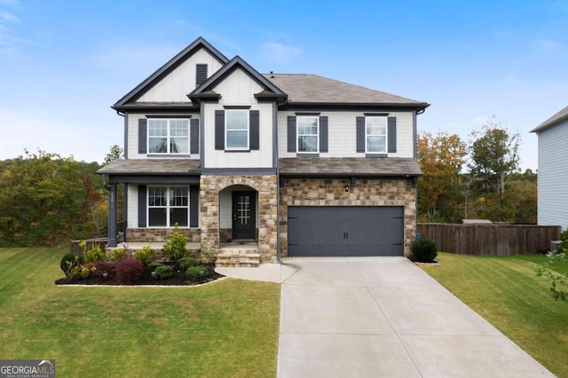 craftsman inspired home with a garage and a front lawn