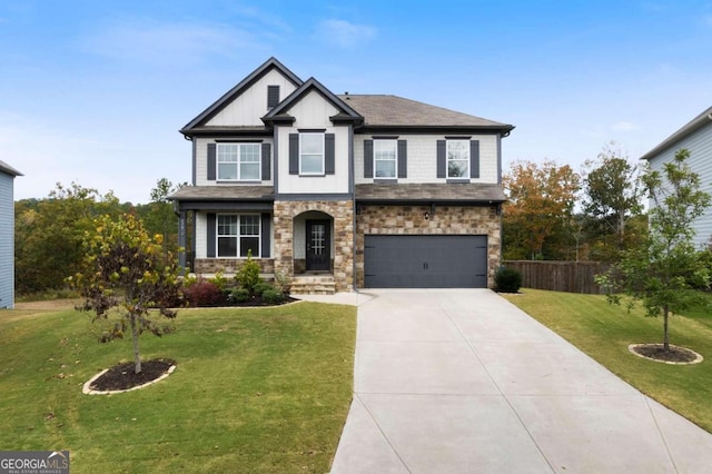 view of front of house featuring a garage and a front yard