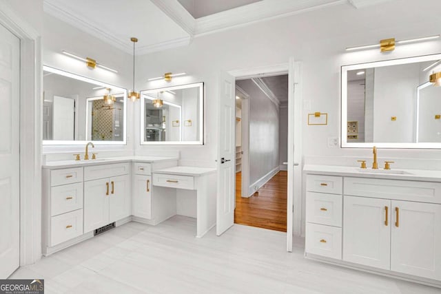 bathroom featuring vanity, crown molding, and wood-type flooring