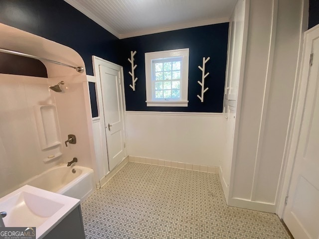 bathroom with vanity and shower / tub combination