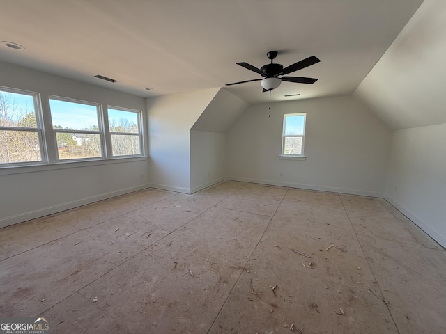 additional living space featuring vaulted ceiling and ceiling fan