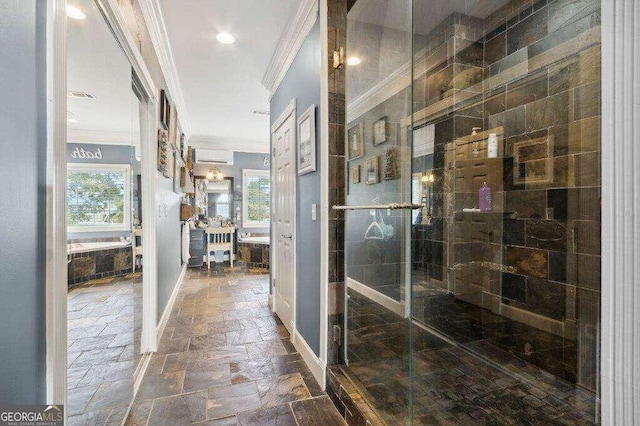 bathroom featuring independent shower and bath, a wealth of natural light, and ornamental molding