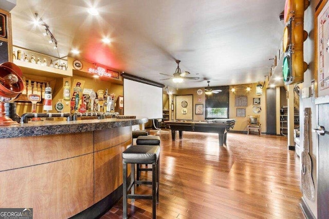 bar featuring ceiling fan, billiards, and hardwood / wood-style floors