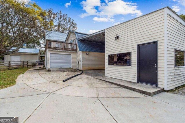 view of property exterior featuring a garage