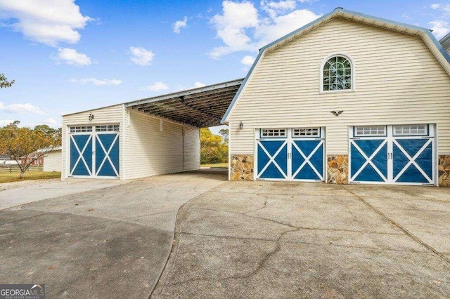 garage with a carport