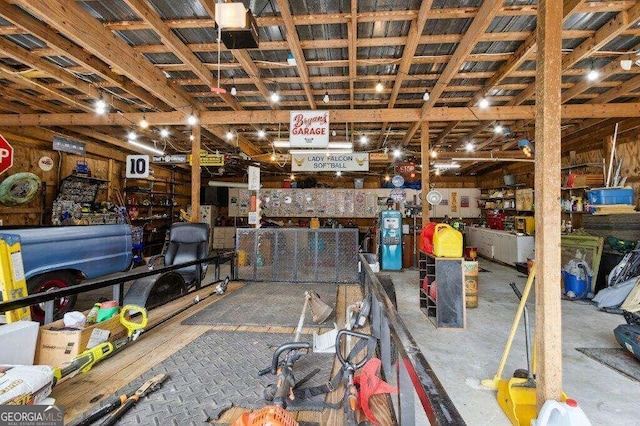 misc room with a workshop area and concrete floors